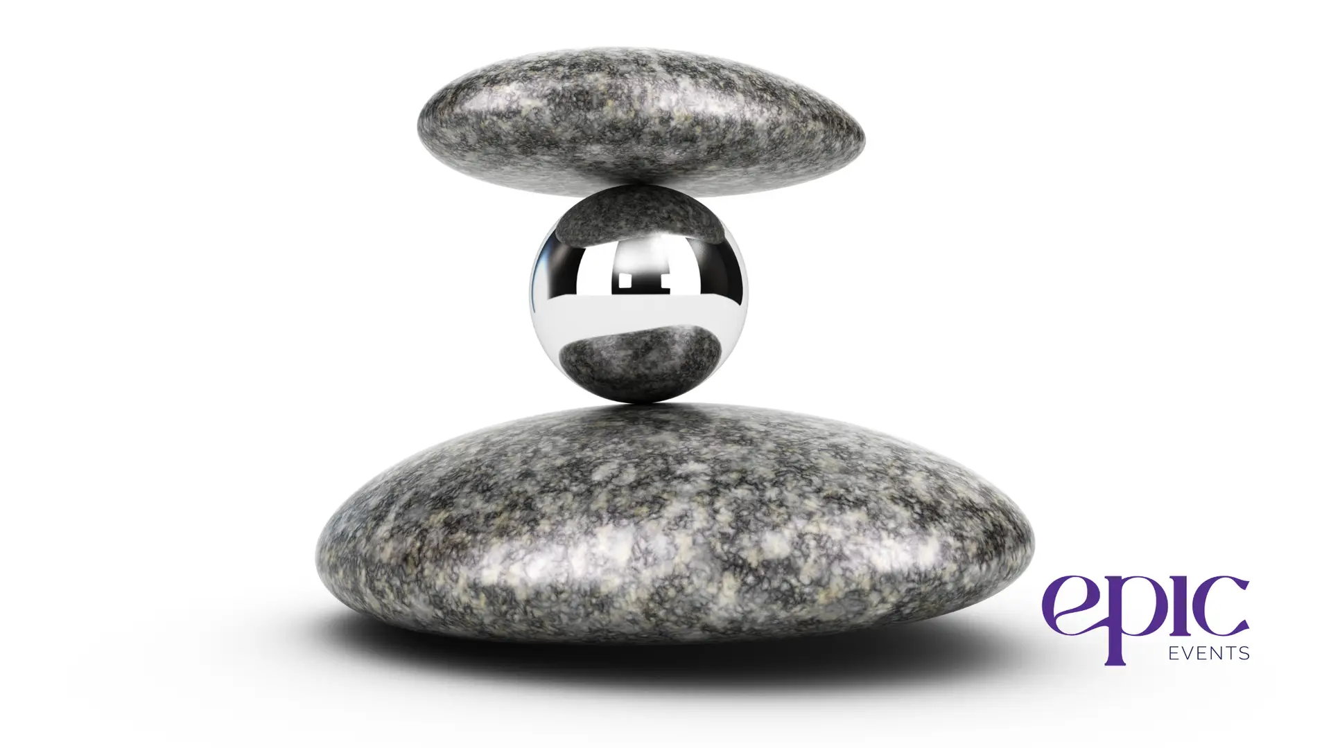 A silver ball perfectly balanced between two flat rocks, symbolizing stability, adaptability, and the careful balance required in corporate event planning.